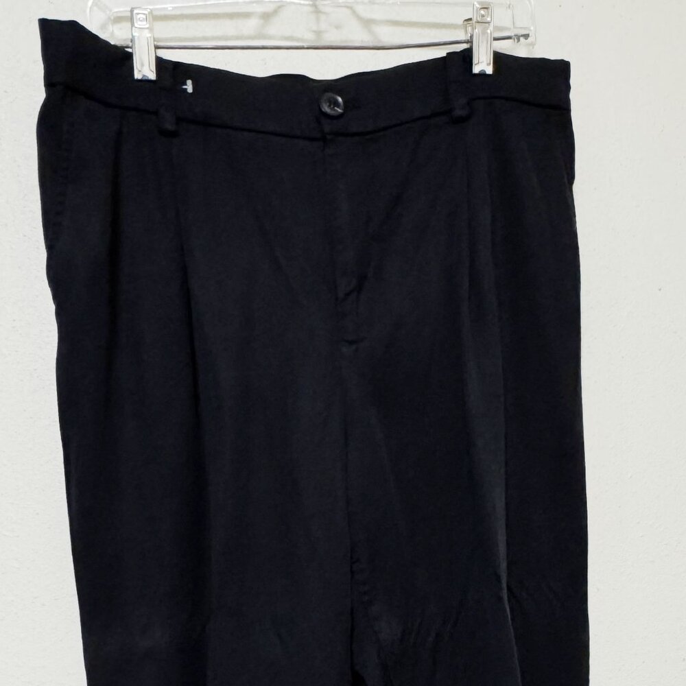 Black tailored pants by The Loft, size: 14